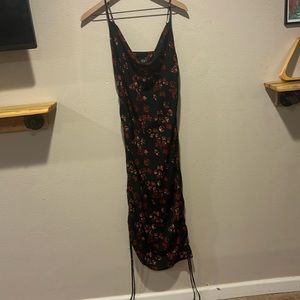 Black silk dress with red roses